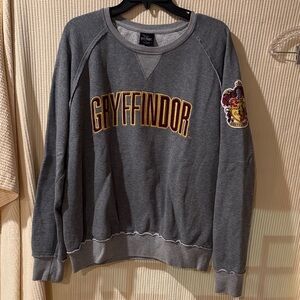 Warner Bros. Harry Potter Gryffindor sweatshirt is a gray Crewneck